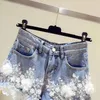 Pantalones cortos de mezclilla con flecos y diamantes de imitación pesados para mujer Pantalones cortos de mezclilla de pierna ancha de cintura alta para mujer