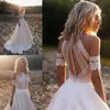 2022 Beautiful Pearls Bohemian Wedding Dresses See Though Top Empire Waist Shoulder Short Sleeves Romantic Lace Satin A-line Count252b