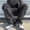 Męskie dżinsy białe hip hop dżinsy paski Tassel strzępiony prosto w lupgy dżinsy Pantie harajuku męskie solidne streetwearne dżinsowe spodnie J230728