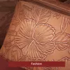 Bolsa de maquillaje de gran capacidad de cuero PU Bolsas de cosméticos en relieve tridimensionales de estilo vintage multifuncional