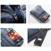 Jeans da uomo Pantaloni da uomo in denim ricamato patchwork strappato Pantaloni larghi larghi firmati hip-hop streetwear slim fit