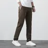 Pantaloni da uomo Pantaloni casual autunnali Pantaloni dritti sottili da affari coreani alla moda Pantaloni cargo da uomo in cotone 69% sottile