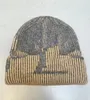 Automne et hiver nouveau port vent personnalité tricoté chapeau automne et hiver chaud oreille hip hop marée chapeau laine chapeau