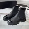 Hösten/vinter låsande blandad svart kalvskinnplattform ankelstövlar platt läder stövel rund tå slip-on stövlar lyxdesigner skor kvinnor fabrikskor