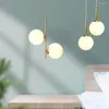 Lampes suspendues Moderne Simple Cuivre Restaurant Lumière De Luxe De Chevet Nordique Designer Creative Boule Acrylique Personnalisée G9 Lampe Suspendue