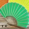 Produits de style chinois ventilateur pliant en forme de coquille de style ventilateur en tissu fait main simple de couleur unie rétro petit ventilateur pliant portable en bambou