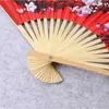 Chinese Style Products 50cm Chinese style large red folding fan used for wedding wall decoration family living room background paper fan craft series