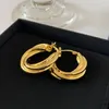 Boucles d'oreilles pendantes à la mode en or 18 carats torsadé lisse circulaire cerceau de luxe femmes bijoux fête de créateur