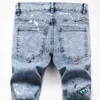 Jeans da uomo Jeans elasticizzati stampati da uomo Fashion Flame Letters Pantaloni in denim dipinti a dollari Pantaloni slim dritti lavati dalla neve J230728