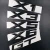 Nuevo estilo de coche ABS negro X1 X3 X5 X6 emblema de maletero trasero Auto Badge Sticker257A