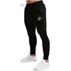 Pantalons pour hommes Sik Silk Pantalons serrés de fitness pour hommes Pantalons de fitness élastiques de printemps Pantalons de sport Z230801