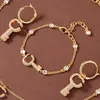 Conjunto de joyas de diamantes de esqueleto para mujer, collar chapado en oro de 18 quilates, pendientes de pulsera, tocado de joyería de lujo de marca elegante a la moda