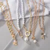 Chaînes femmes cou chaîne multicouche perle colliers pour femmes mode clé serrure Portrait goutte tour de cou 2023 tendance bijoux