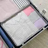 Borse portaoggetti Jinna Borsa da viaggio multifunzionale Tuta da sette pezzi Valigia Set di smistamento di vestiti