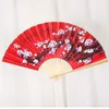 Produtos de estilo chinês 50cm estilo chinês grande ventilador dobrável vermelho usado para decoração de parede de casamento família sala de estar plano de fundo ventilador de papel série artesanal