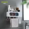 Portaspazzolini ECOCO Montaggio a parete Dispenser automatico di dentifricio Set di accessori per il bagno Dispenser di dentifricio Spremiagrumi Strumento portaspazzolino 230731