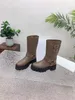 العلامة التجارية الكلاسيكية الفاخرة Triumphal Arch Hardware Buckle Martin Boots الخريف/الشتاء الشتاء الطبقة العصرية العجل أحذية جلدية عالية الجودة