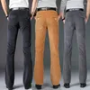 Calça masculina 2023 primavera outono longa veludo cotelê cor sólida casual flare masculina calças de negócios roupas H387