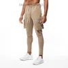 Herrbyxor Autumn New Men's Jogging Pants Cotton Pocket Design Running Freight Pants Gym Men's Fitness Multi Pocket Style Training Set Z230731