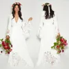 2017 Summer Beach Boho Abiti da sposa Bohemian Hippie Style Abiti da sposa economici Abito da sposa a maniche lunghe in pizzo con fiore Plus Size286B