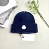 Projektant luksusowy czapka czapka czaszka zimowa czapka unisex kaszmirowe litery swobodne dzianiny z maski na zewnątrz Wysokiej jakości zimowe czapki styl para