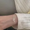 Länkarmband japanska och koreanska ins kallstil metalllegering persika hjärtdubbel hjärtformad armband kvinnlig ring spänne liten