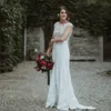 Elegant spetsjuljedöd bröllopsklänning juvel nackmössa ärm är front split brudklänningar satin svep tåg trädgård vestido de mariee