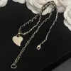 Designer sieraden ketting dubbel dragen lederen ketting voor vrouwen zwarte perzik hart hanger kraag ketting goud beroemdheid temperament legering lichte luxe