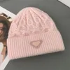 Berretti con teschio/teschio Designer Brand Cappello di moda Inverno caldo lavorato a maglia Protezione per le orecchie Casual da uomo e da donna Sci all'aperto ATIS