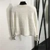 Giacca firmata Donna Cardigan Cappotto Girocollo Maniche lunghe Maglia Top Bottoni in metallo Decorato Bianco Cappotti eleganti Cardigan Giacche Abbigliamento firmato da donna