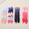 Accessori per capelli 10 pezzi / set fiocchi di nastro in grosgrain solido con clip ragazze piccolo fiocco per bambini copricapo fai da te per bambini bambino