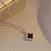 Collier trèfle de styliste en acier et titane pour femmes, pendentif double face, nouvelle mode, chaîne de pull pour sens senior