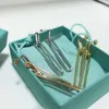 Fashion designer tiff ring top T home fashion U-shaped gold earrings long simple 925 Sterling Silver tassel high-grade feeling Earrings