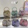 Glanzende en aanhoudende kleurrijke grind geleidelijke tassel emmertas avond banket water diamanten ketting handheld crossbody tas meisje 230401