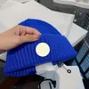 럭셔리 겨울 니트 모자 클래식 두꺼운 따뜻한 모직 모자 남성 여성 유니osex 두개골 모자 고르 로스 보닛 디자이너 비니