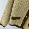 Diseñador Milan Runway Suéteres 2023 Nuevo Otoño Invierno V Cuello Manga larga Tops Marca Mismo estilo Abrigos Suéter de mujer KE5K