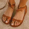 Nieuwe sandalen dames dames open teen string flip-flop clip platte gesp casual strandschoenen sandalias de las mujeres