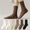 Chaussettes en coton tricotées pour femmes, décontractées, amples, longues, douces, couleur unie, respirantes, Tube moyen, printemps automne, noir, blanc