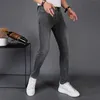 Pantalones vaqueros informales gris oscuro para hombre, pantalones ajustados finos de verano 2022, marca de moda de gama alta