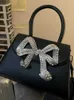 Bolso de mano de diseñador pequeño de primera calidad 2022, nuevo bolso cruzado con lazo de diamante, bolso de mujer, marca de lujo ligera 230401