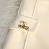 Pantalones cortos de lana con parches y logo de letras de cintura alta para mujer SMLXLXXL