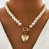 Choker chokers elegant guldhjärta pärlhalsband för kvinnor mode på spänne halsband 2023 Trend bröllop smycken gåvachokers llis22