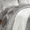 Set di biancheria da letto 2023 di lusso 50% seta jacquard Lyocell Set liscio lucido Copripiumino lenzuolo Federe King Size 4 pezzi