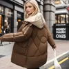 Mulheres para baixo parkas 2023 inverno jaqueta de algodão feminino solto engrossar quente falso casaco de duas peças longo senhoras zíper 231031