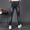 Niebieskie granatowe dżinsy szczupły trend letni wszechstronna wąska wysokość nogi małe proste europejskie spodnie