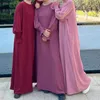 Ethnische Kleidung unter Abaya, inneres langes Slip-Kleid, einfarbig, gesmokte Manschetten, islamische muslimische Frau, lässig, Dubai-Türke, bescheidene Hijabi-Robe