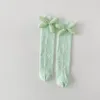 Frauen Socken Kinder Großhandel Frühling Candy Farbe Bogen Prinzessin Baumwolle Mädchen Mid-Rohr Ferse Weniger