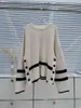 Kadın Sweaters 2023 Kış Giyim Boşta Stili Çizgili Yan Düğme Bölünmüş Örgü Sweater 1014