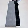 Stickerei-Frauen-Kleid-reizvolle ärmellose Schlitz-Kleider Grau-Schwarz-Strickkleid