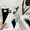 Chaussettes à la mode pour femmes, décontractées, noires et blanches, en trois dimensions, avec nœud floral, imprimé torsadé, princesse féerique, K1031